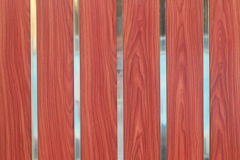 red stained wooden fence