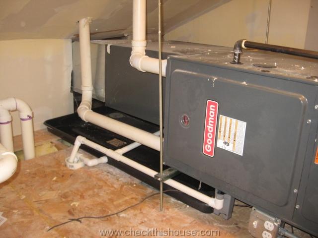 Picture of the attic air conditioner drip pan installation