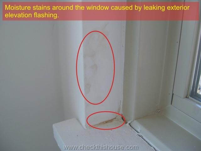 Chicago condo inspection - moisture stains around the windows caused by leaking exterior flashing