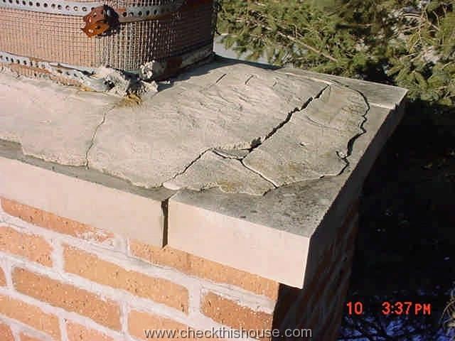 Brick chimney crown assembled from limestone blocks separating at mortar joints