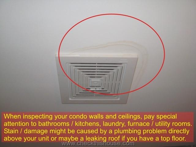 Condo walls and ceiling inspection - leakage stains around the bathroom exhaust fan caused by leaking toilet above