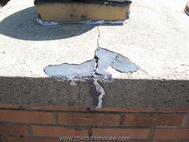 Cracked chimney crown - no expansion gap provided around the chimney flue