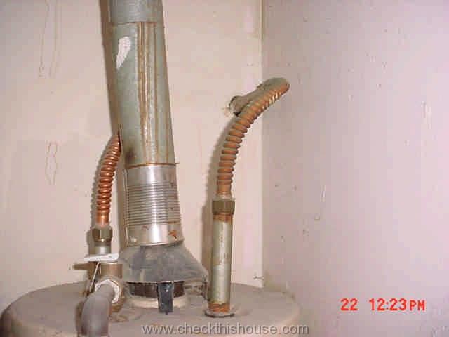 Food can used as a water heater vent pipe is not permitted