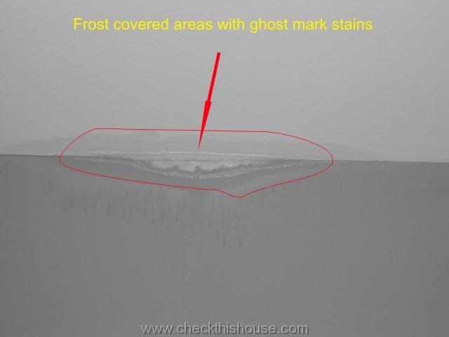 Water marks on walls - frost covered areas with ghost mark stains, possibility of mold growth behind the wall