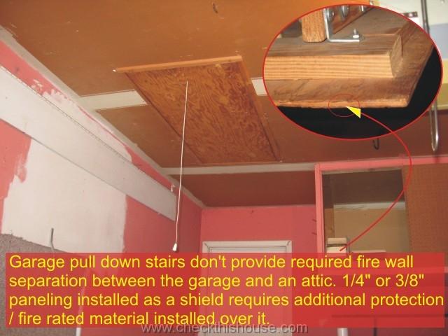 Attached garage firewall - attic pull down stairs finished with a quarter of na inch thick paneling violate fire wall separation