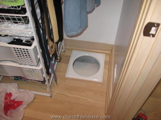 Laundry chute hazard - second floor laundry chute mounted on the floor surface with a 9' drop underneath